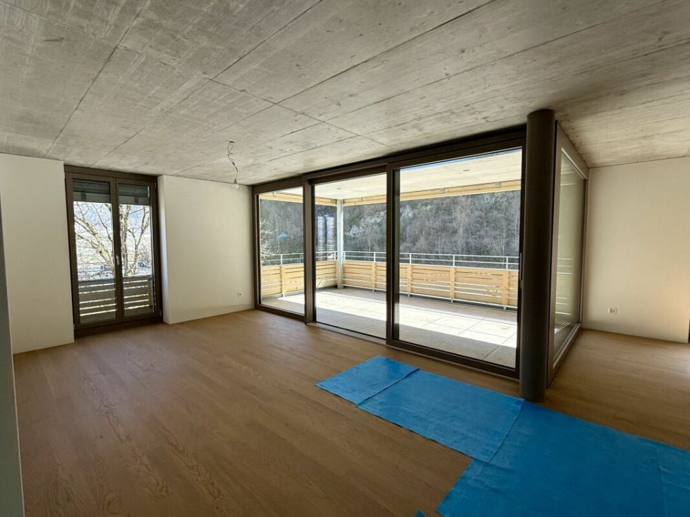 Erstbezug - 4.5 Zimmer-Wohnung - Überbauung Bawangs - Wohnzimmer Materialisierung