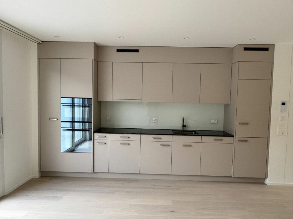 Erstvermietung: hochwertige 3.5-Zimmer-Attikawohnung mit Schloss- & Bergsicht - Bild 4