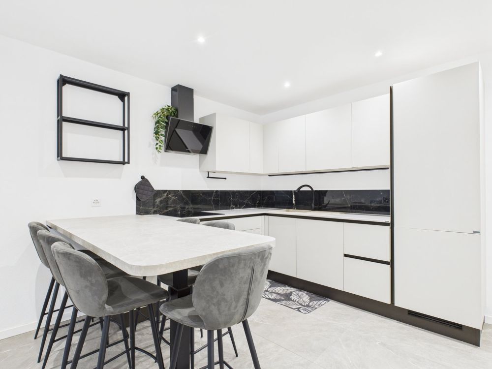 NUOVA COSTRUZIONE:APPARTAMENTO DI 3,5 LOCALI CON GIARDINO E POSTO AUTO - Bild 1