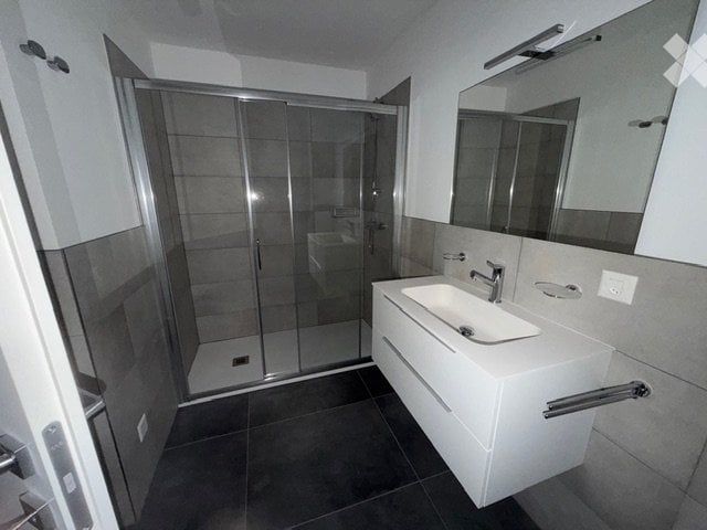 Affittasi appartamento nuovo 2.5 locali con balcone - Bild 8