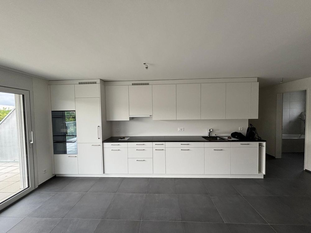 Moderne 2.5-Zimmer-Neubauwohnung mit grossem Balkon & Tiefgaragenparkplatz in Bülach - Bild 1