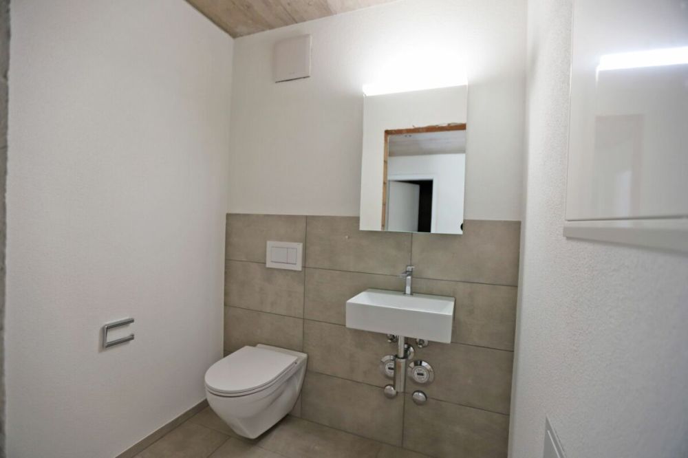 Neubau 3.5-Zimmerwohnung mit sonnigem Sitzplatz! - Bild 4