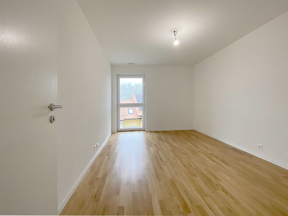 Bel appartement de 3.5 pièces situé à Epautheyres dans immeuble Minergie - Chambre 1.2.jpg