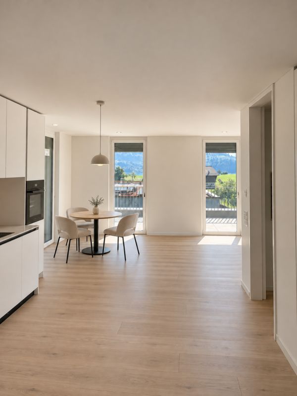Neubau - 2.5-Zimmer-Attikawohnung mit spektakulärer See- und Alpensicht - Offenes Raumkonzept mit fliessendem Übergang zur Attikaterrasse