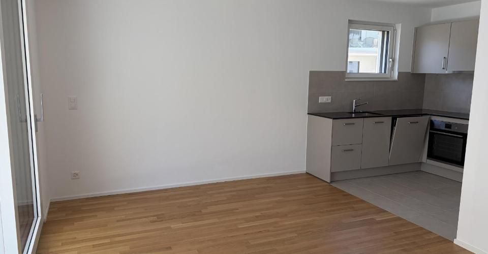 Magnifique appartement de 2.5 pièces au 1er étage d'un immeuble neuf avec balcon - E102 - Appartement 2.5 pièces - image - 2