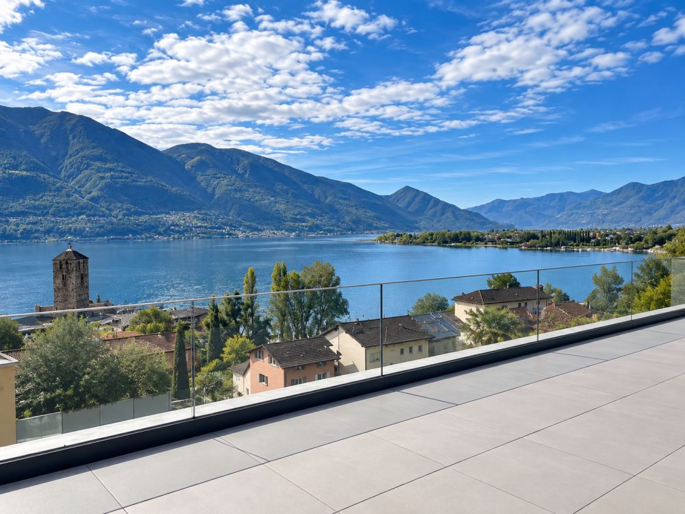 Esclusivi attici di nuova costruzione con grande terrazza e vista lago - Bild 3