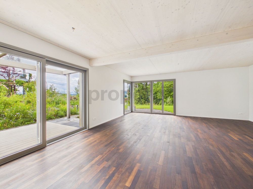Stilvolles Neubau-Einfamilienhaus in nachhaltiger Holzbauweise mit Naturgarten und Alpenblick - Image 5