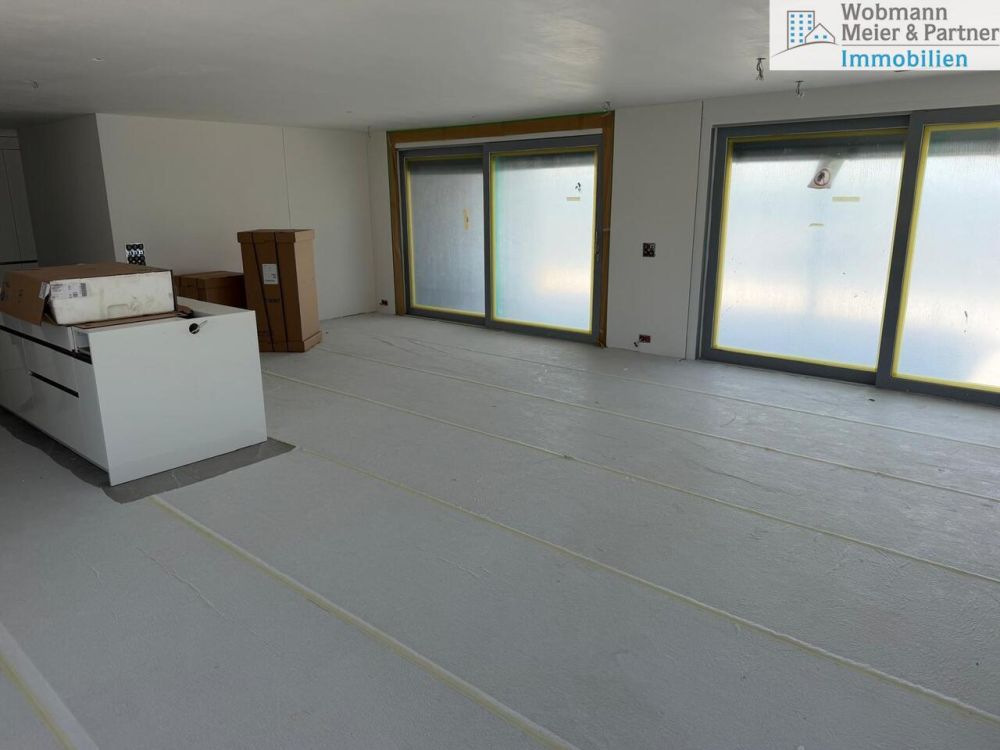 Exklusive 4.5-Zimmer-Attikawohnung mit schönster Aussicht - Küchen-/Wohnzimmer