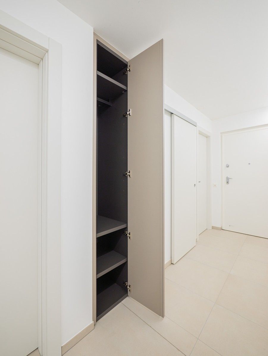 Nuovissimo 2,5 locali in medio-alto standing con terrazza coperta - Bild 8