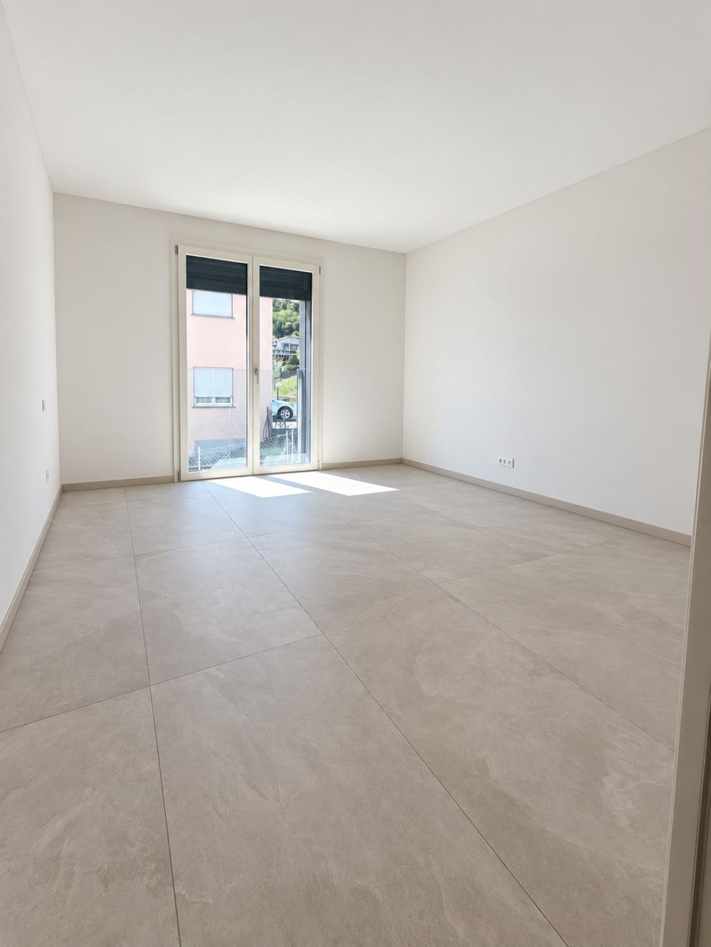 APPARTAMENTO 4.5 LOCALI CON AMPIO PORTICO IN AFFITTO A BIOGGIO - Bild 4