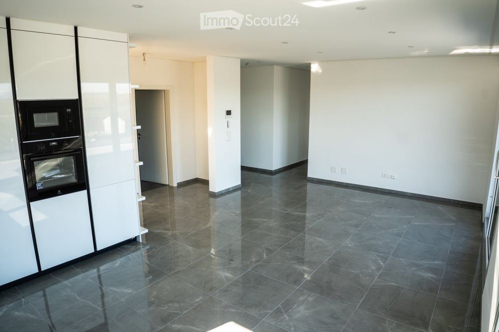 Exklusiv 5,5 Zimmer-Wohnung in Villa mit Blick auf den See und die Berge - Bild 4