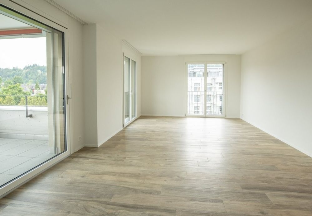 ERSTVERMIETUNG - Komfortabel Wohnen in Reinach mit eigener Waschküche - Wohn-_Esszimmer.jpg