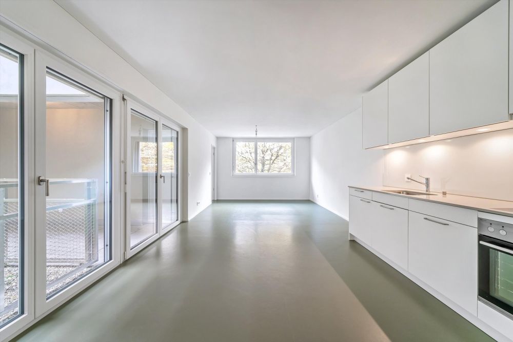 Ihre neue Traumwohnung mit begrünten Atrium - Wohnzimmer