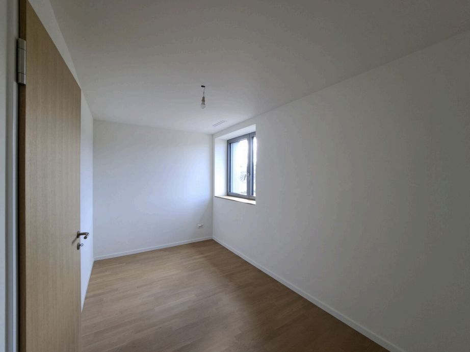 Attique neuf de 4.5 pièces avec activité de conciergerie - Chambre_3.png