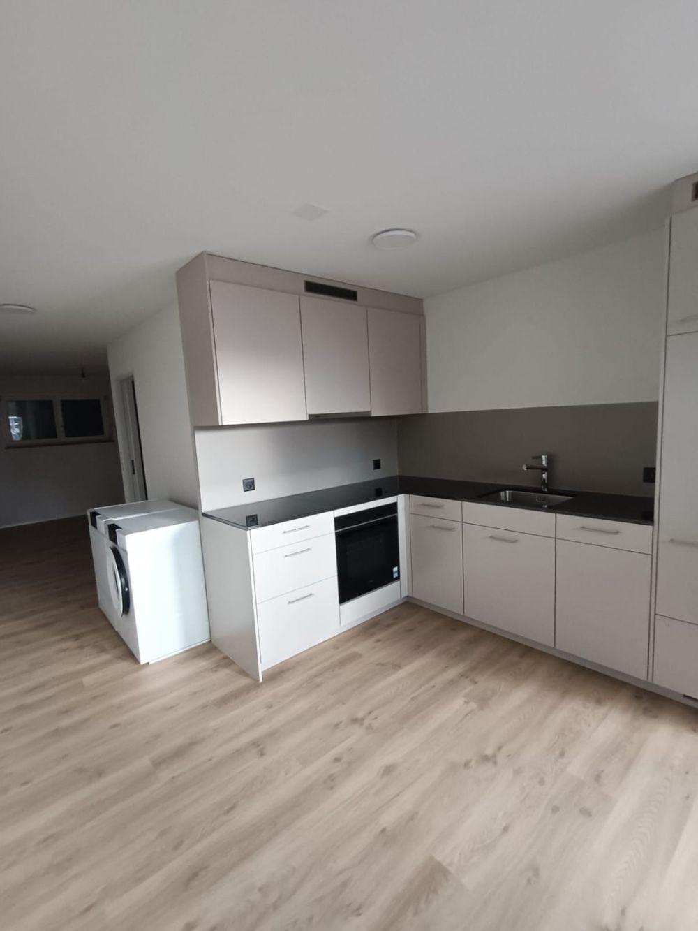 1.5 Zimmer Neubauwohnung - Bild 1