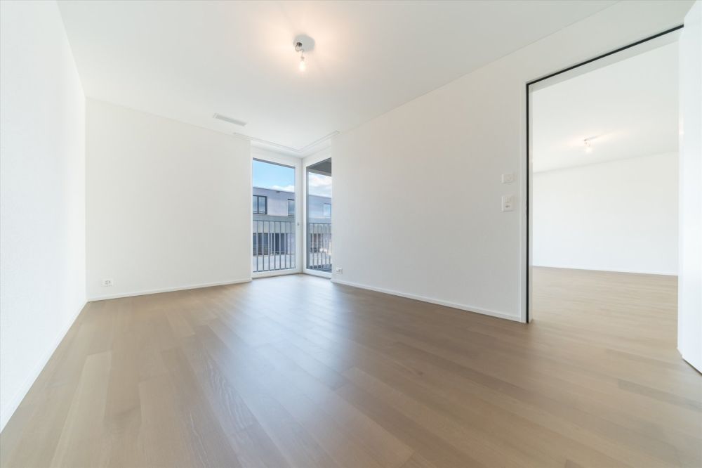 Topmoderne Wohnung direkt beim Bahnhof Suhr - Zimmer