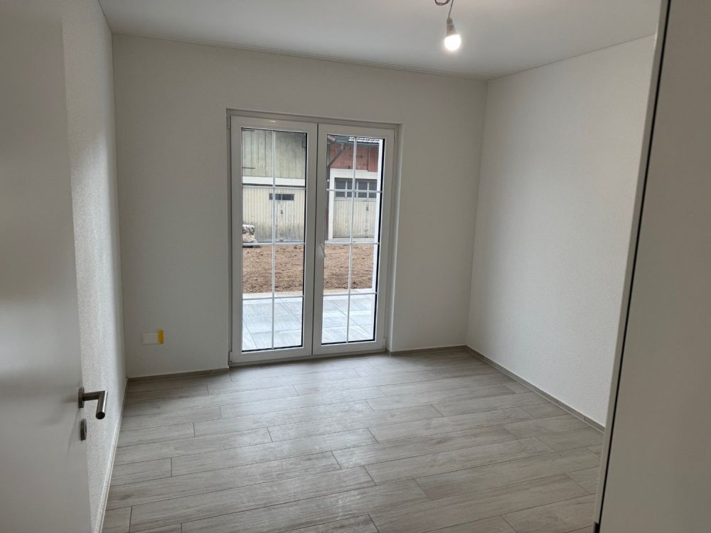 Erstvermietung moderne 4.5-Zimmer-Parterre-Wohnung - Zimmer