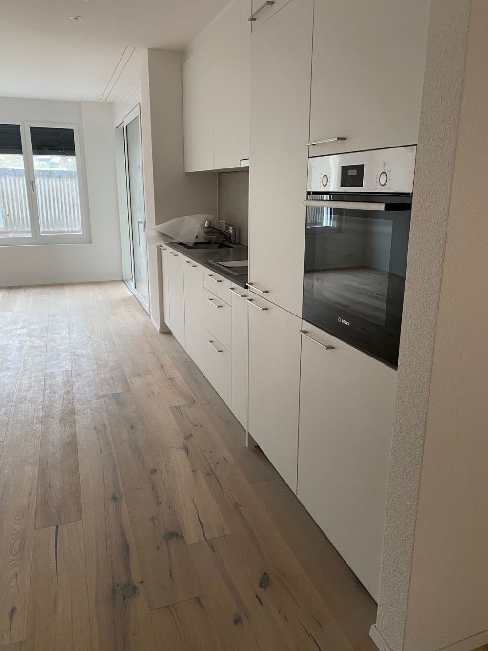 Erstvermietung moderne 2.5 Zimmer Parterrewohnung mit Sitzplatz, Minergie P - Bild 2