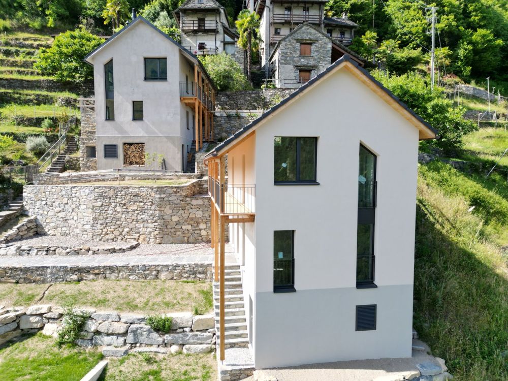 Casa unifamiliare con terreno e posti auto coperti - Bild 8