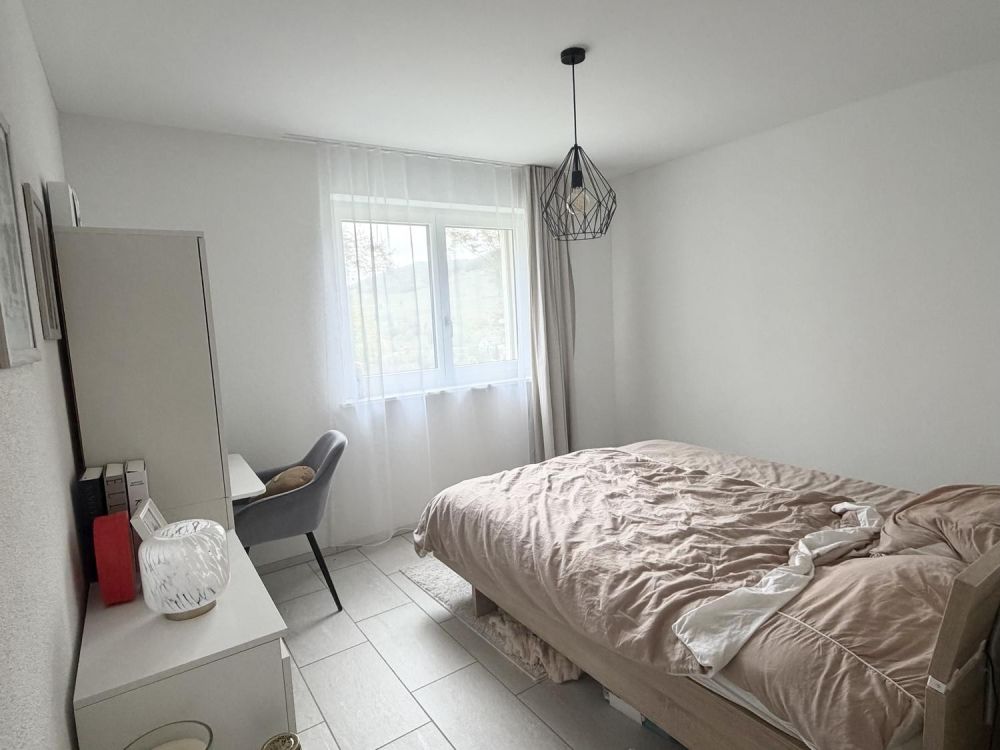 Moderne 3.5-Zimmerwohnung mit wunderschönem Garten und Aussicht - Bild 5