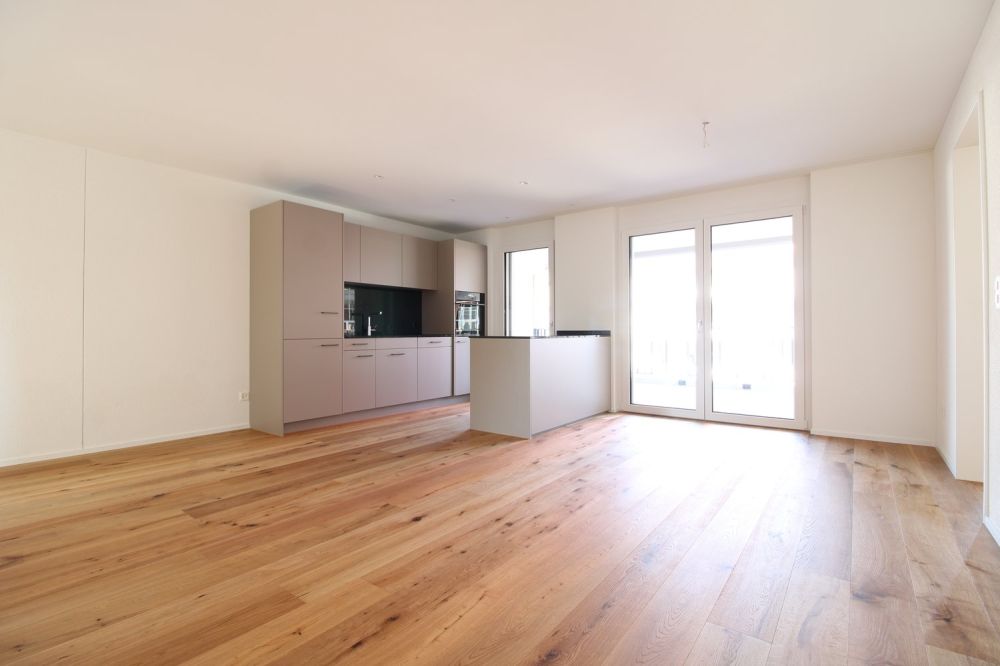 Charmante 3.5 Zimmer Neubauwohnung - Bild 1