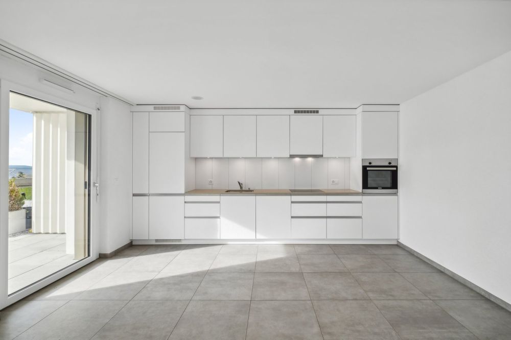 Location avec caution gratuite - Immeuble avec vue sur le lac - Küche