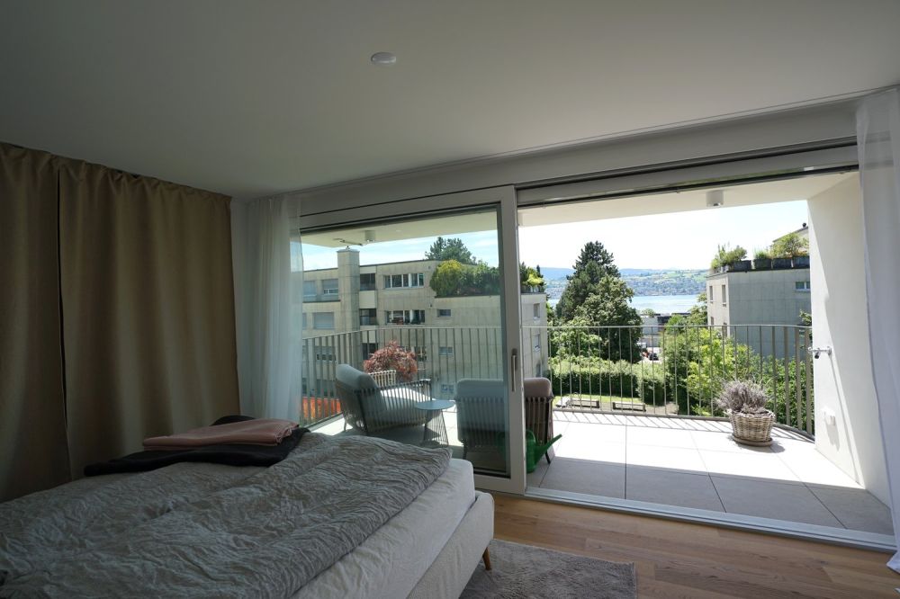 Neubauwohnung mit Gartensitzplatz, zwei Balkonen und traumhafter Seesicht - Bild 4