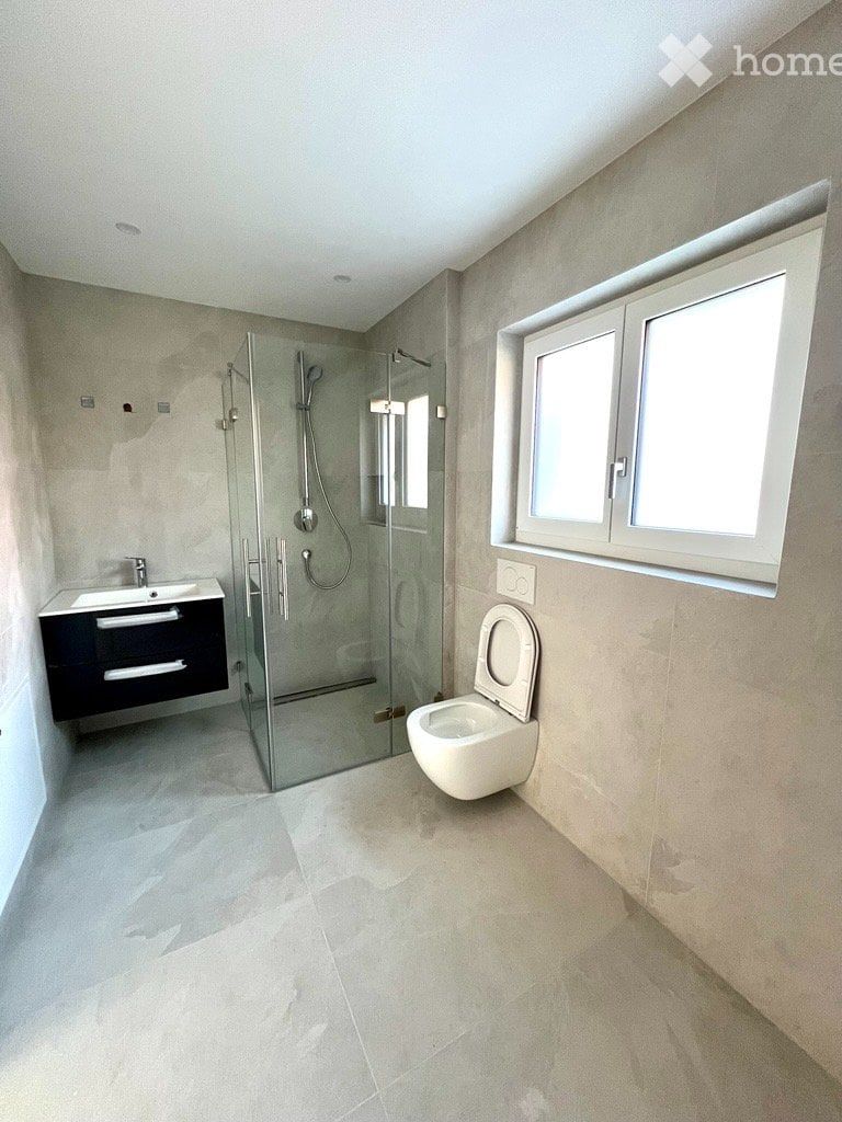 Erstvermietung: Moderne 3.5-Zimmer-Wohnung mit Terrasse - Bild 3