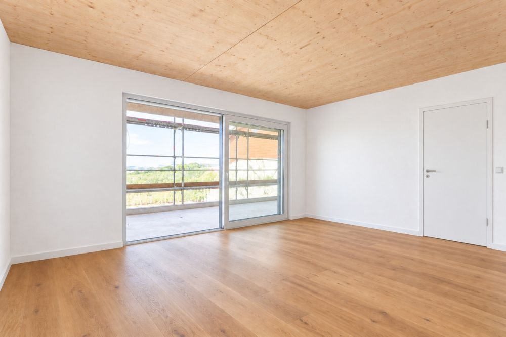 attraktive und grosszügige 2.5-Zimmer Neubauwohnungen zu vermieten - Obergeschoss - Wohnzimmer KI generiert
