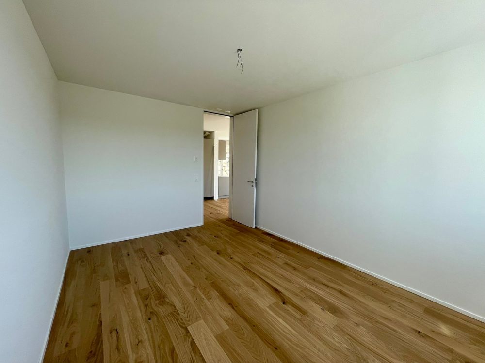 TOP: Wohnen mit Weitblick | Moderne 2.5 Zimmer Neubauwohnung mit grosser Terrasse - Bild 10