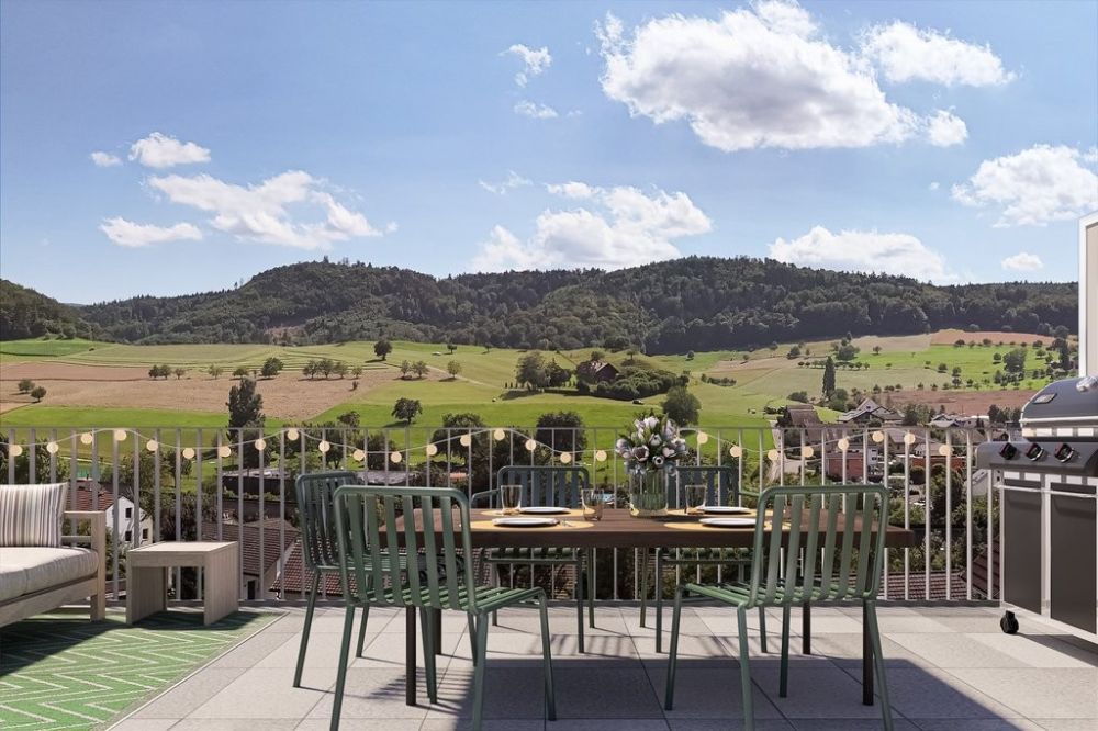 ERSTVERMIETUNG - 6.5-Zi.-Reiheneinfamilienhaus mit PV-Anlage - obererchrueziweg_innen_eg_balkon_aussicht_Haus01.jpg