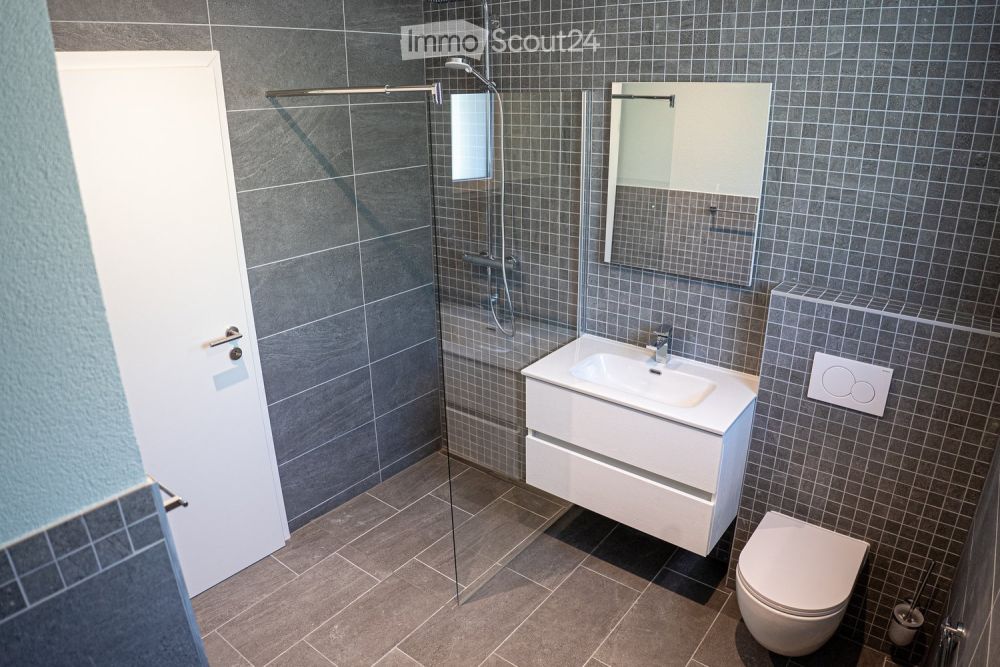 Exklusiv 5,5 Zimmer-Wohnung in Villa mit Blick auf den See und die Berge - Bild 13