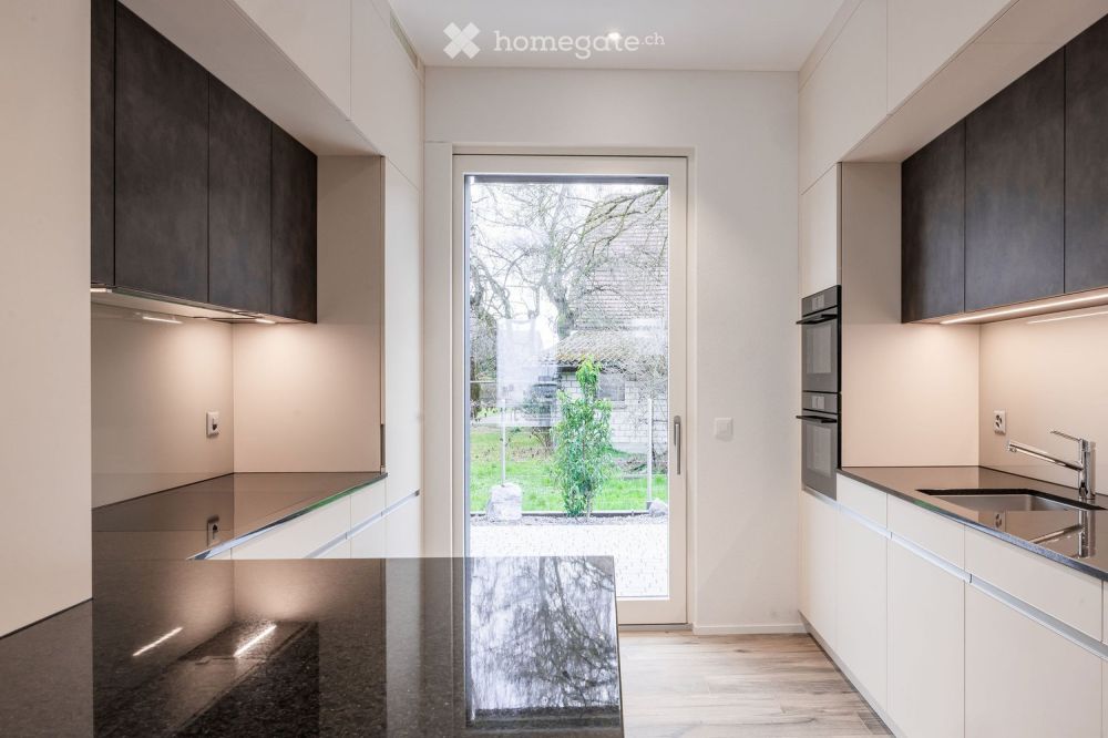 Erstvermietung 3 1/2 Zimmer Parterrewohnung im Eigentumsstandart - Bild 1