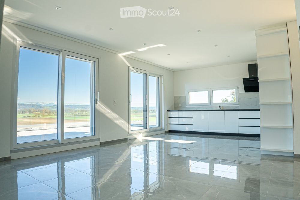 Exklusiv 5,5 Zimmer-Wohnung in Villa mit Blick auf den See und die Berge - Bild 2