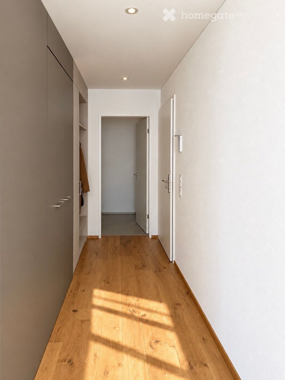 Moderne 3.5-Zimmer-Maisonette-Wohnung in Höri – Neubau mit Balkon und Garage - Bild 2