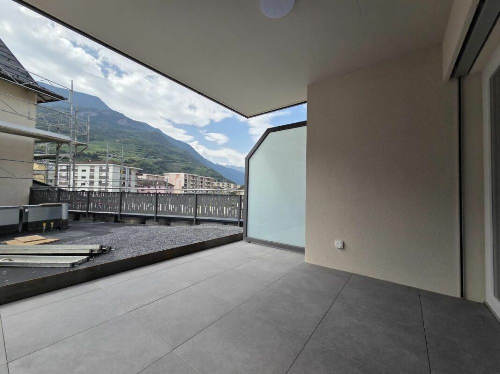 Neuf - Appartement de 2.5 pièces avec balcon et place de parc - Bild 7