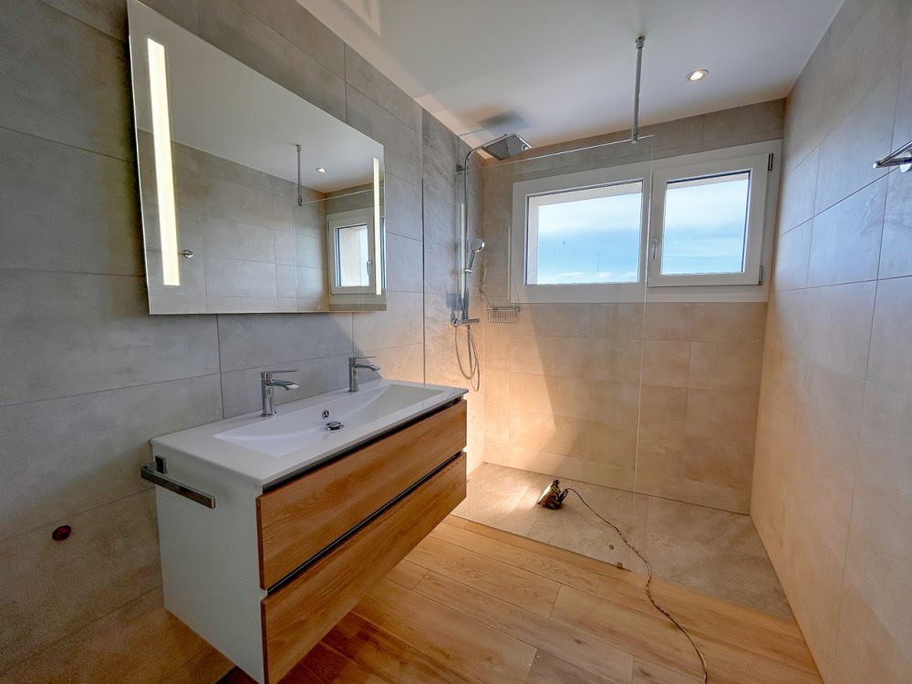 Superbe 3.5 pièces dans nouvelle construction - avec local de stockage - Bild 12