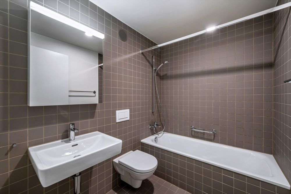 Atriumwohnung in urbanem Zentrum - Bad