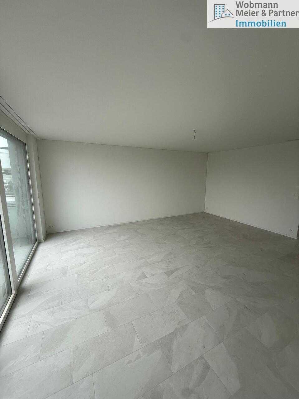Erstbezug 2026 - Exklusive 3.5-Zimmer-Attikawohnung mit zwei Terrassen - Wohnzimmer