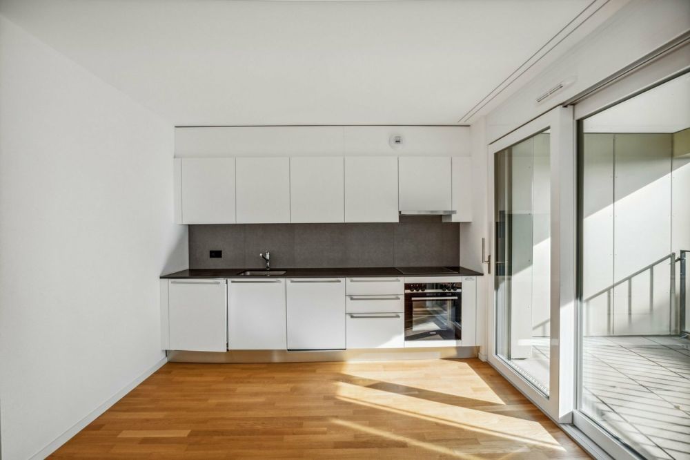 Logement dans récent quartier situé au coeur de la ville d'Orbe - Küche