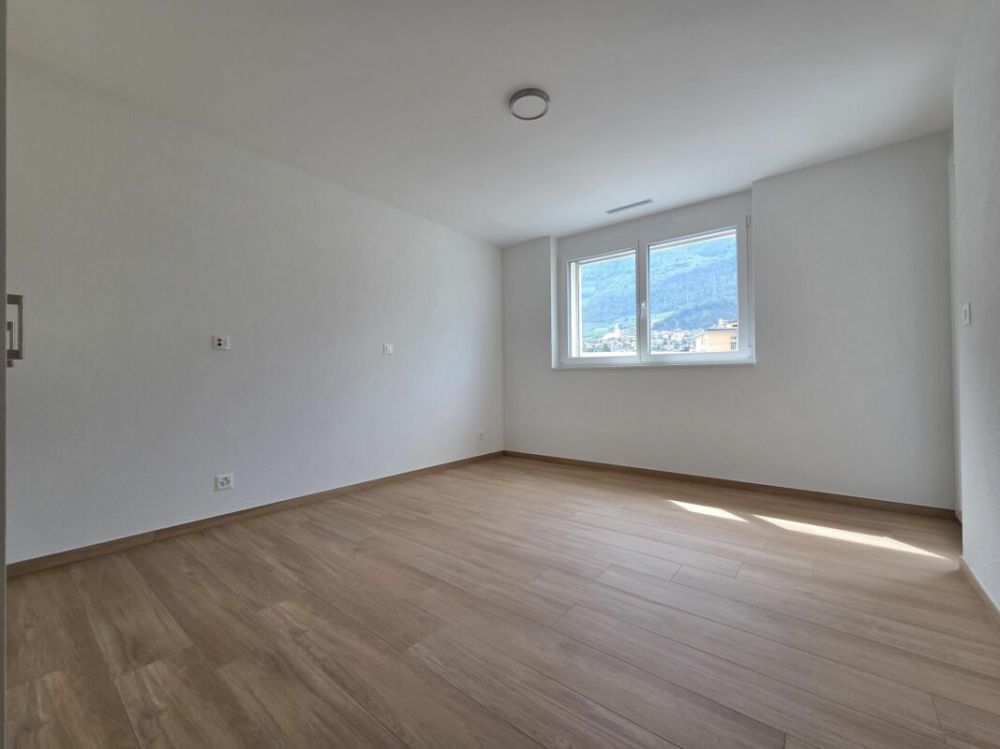 Neuf - Appartement de 3.5 pièces avec balcon et places de parc - Bild 4