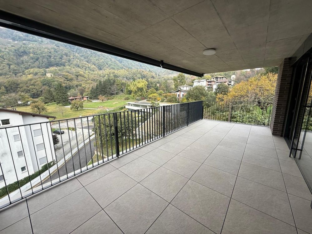 Moderno appartamento 3.5 locali con balcone a Bioggio - Bild 4