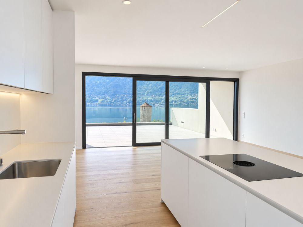 Esclusivi attici di nuova costruzione con grande terrazza e vista lago - Bild 2