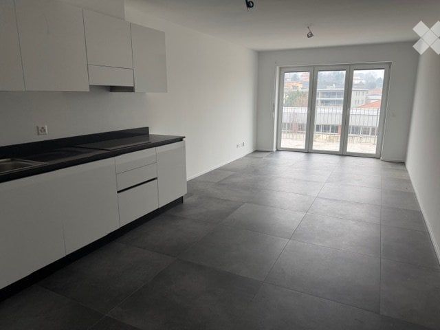 Affittasi appartamento nuovo 2.5 locali con balcone - Bild 4