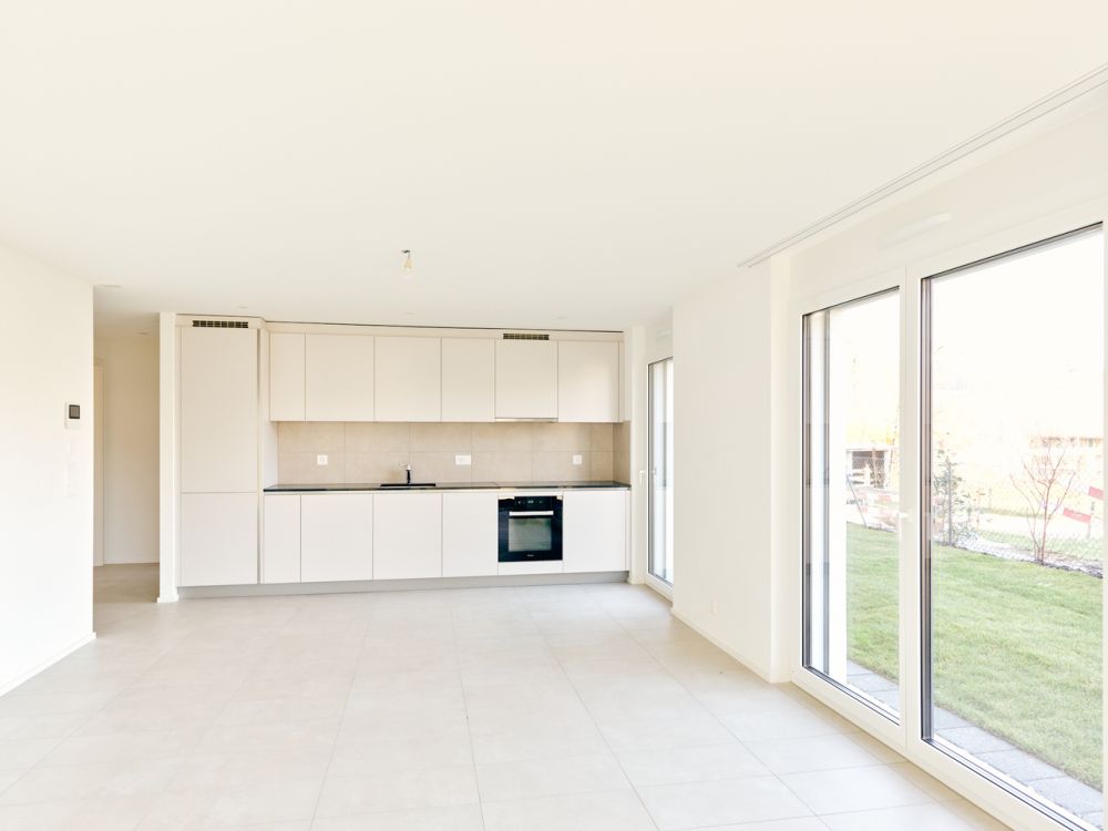 4.5 pièces neuf au rez avec jardin, idéal pour une famille - Bild 2