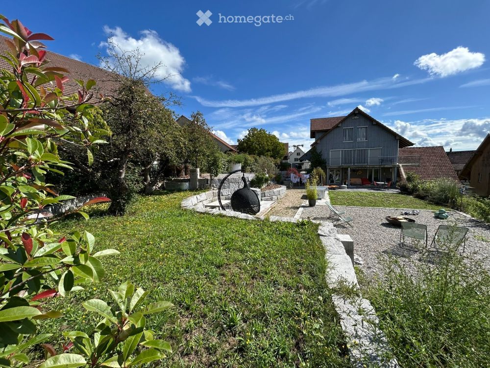 Moderne 3.5-Zimmer-Wohnung in ruhiger Lage von Truttikon und mit einzigartiger Gartenanlage - Bild 1