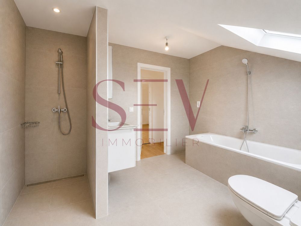 NEUF - Appartement traversant de 4.5 pièces, de 129m2 - Salle de bains avec douche