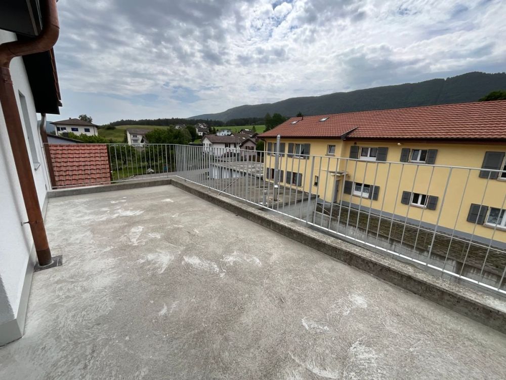 Charmantes 3.5-Zimmer-Neuwagenwohnung mit großer Terrasse - Bild 9