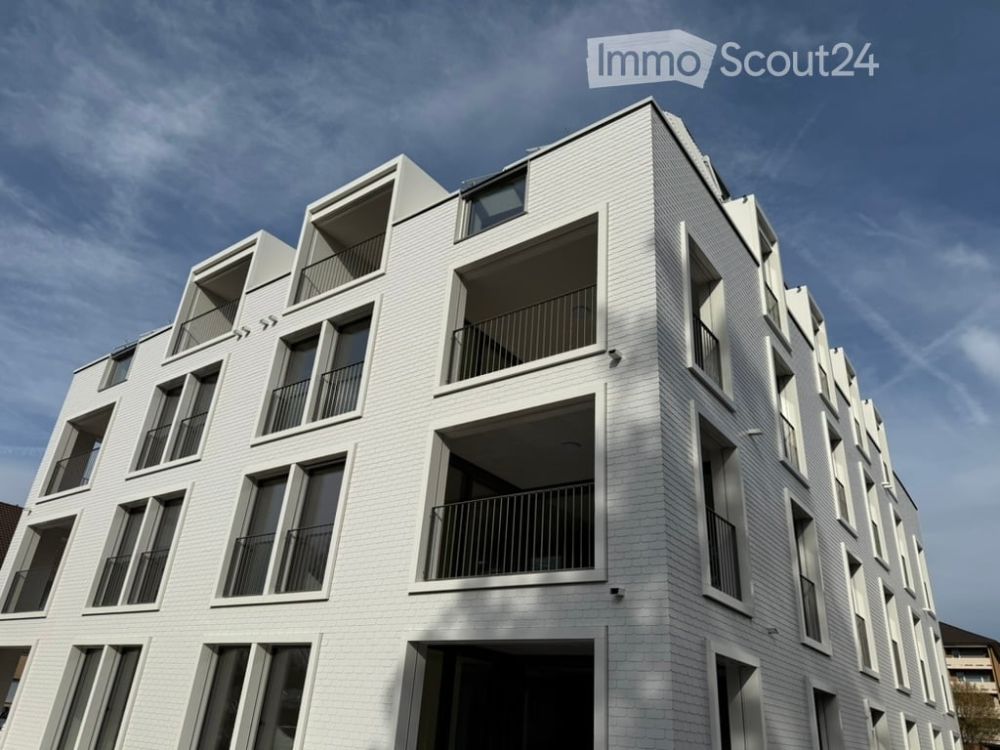 3.5 Zimmer Neubau Wohnung in Volketswil mit 11 qm Loggia und TG mit E-Auto Ladestation - Bild 1