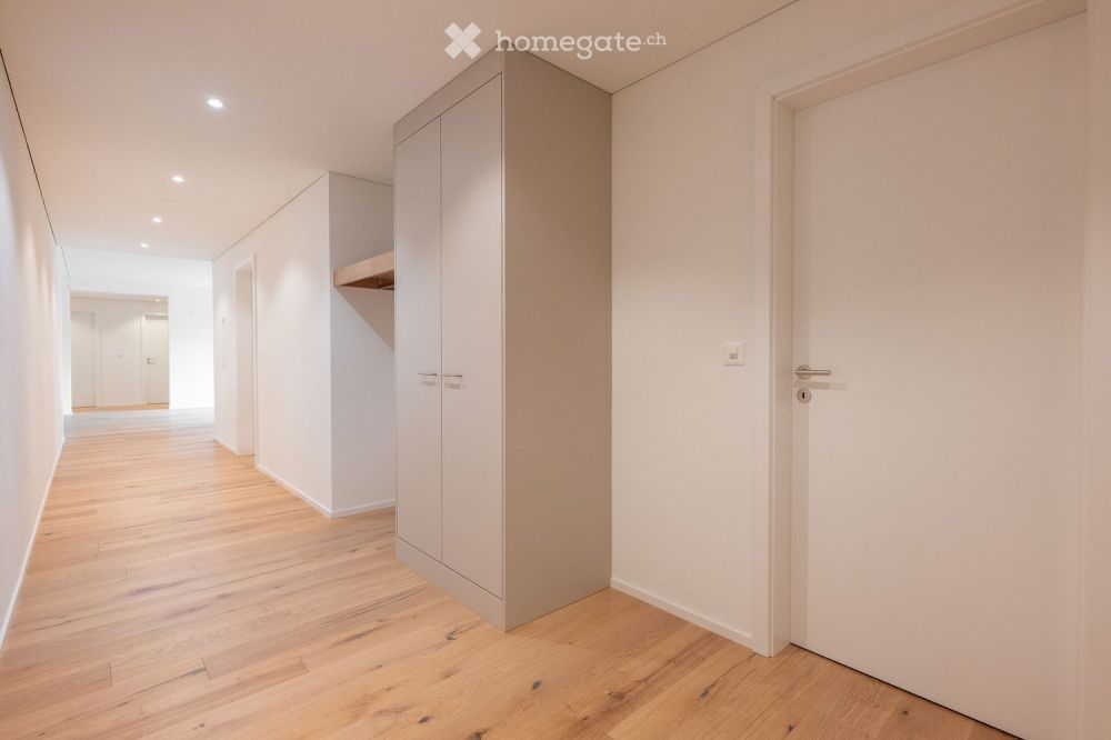 Moderne 5.5 Zimmer Eigentumswohnung mit grossem Sitzplatz - Bild 7